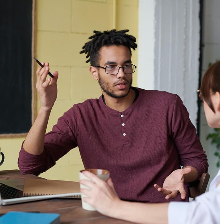 Picture of an editor deep in conversation