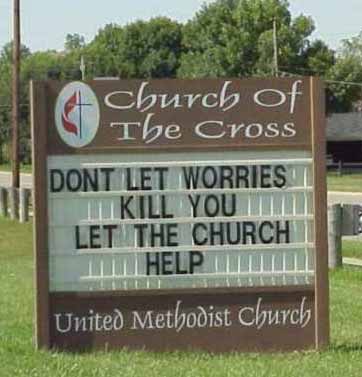 Sign Reads: "don't let worries kill you let the church help"