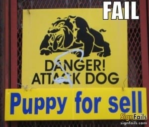 Sin reads: "danger attack dog" followed by "puppy for sale"