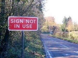 Sign reads: "sign not is use"
