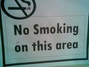 Sign reads: "no smoking on this area"