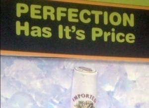 Sign reads: "perfection has it's price."