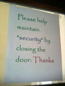 Reads: please maintain "security" by closing the door