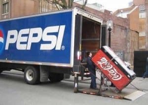 Coca-cola vending machine and pepsi lorry