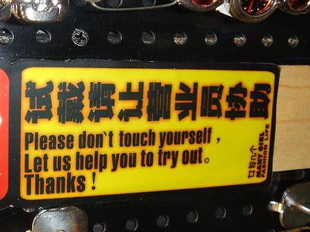 Badly translated sign tells vehicle owner not to touch themselves